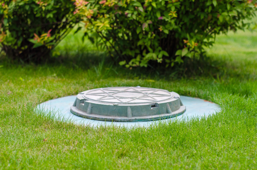 Cesspool,on,the,backyard,green,lawn